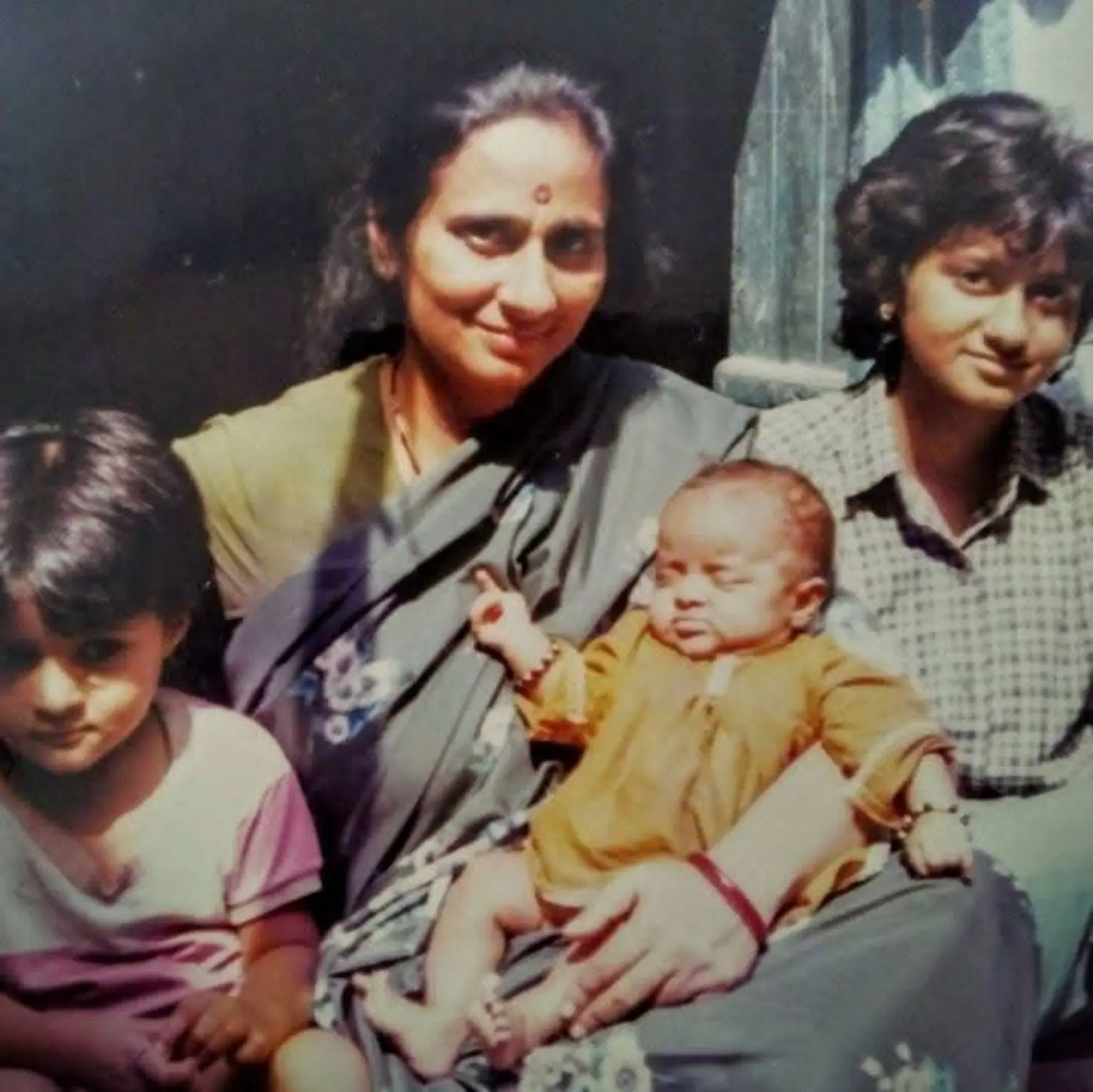 Rekha Joshi with Anu, Mini and Rini in a family photograph