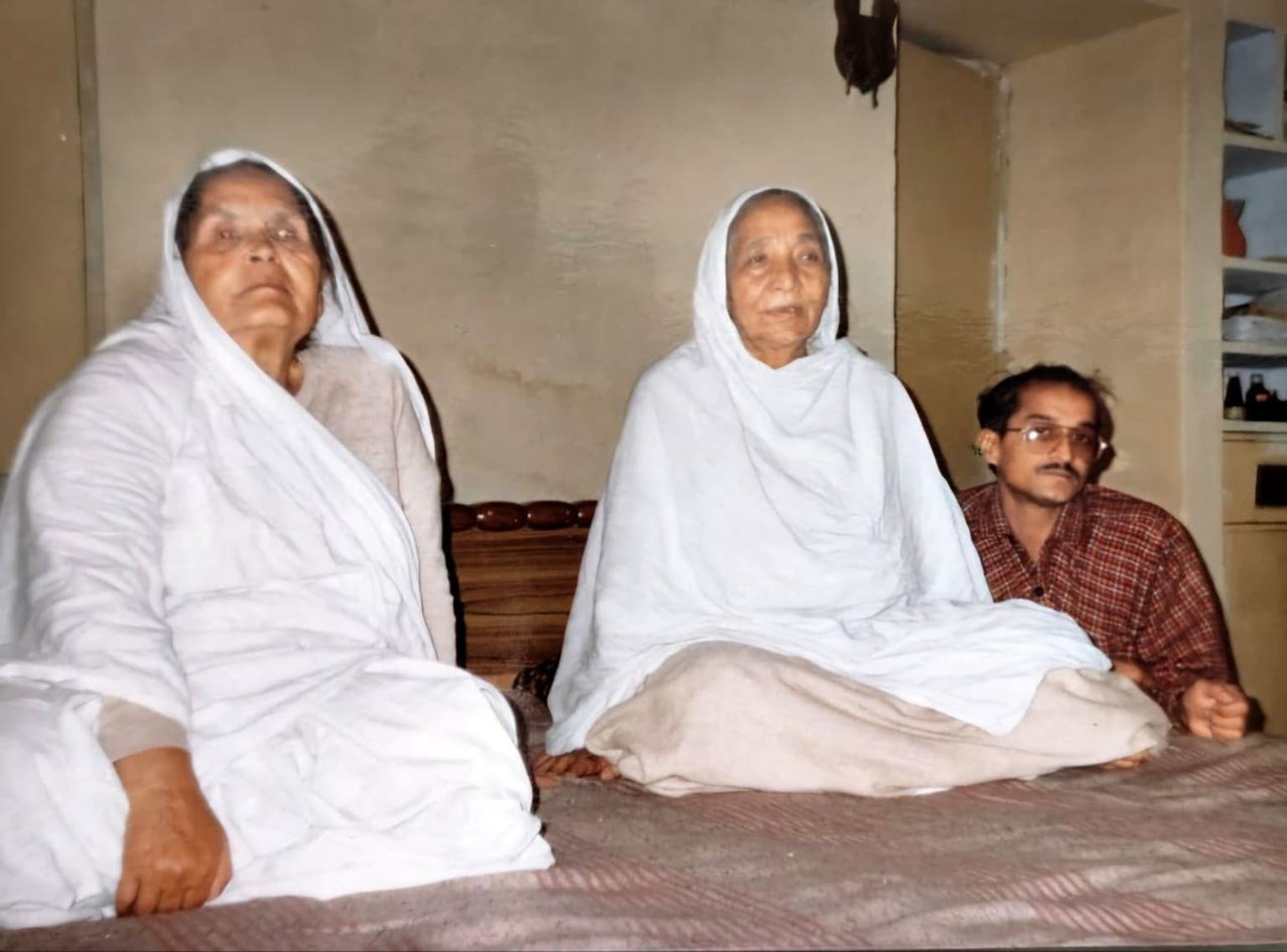 Sumati’s father seated beside Ma and Choti Ma at the family home in Bareilly